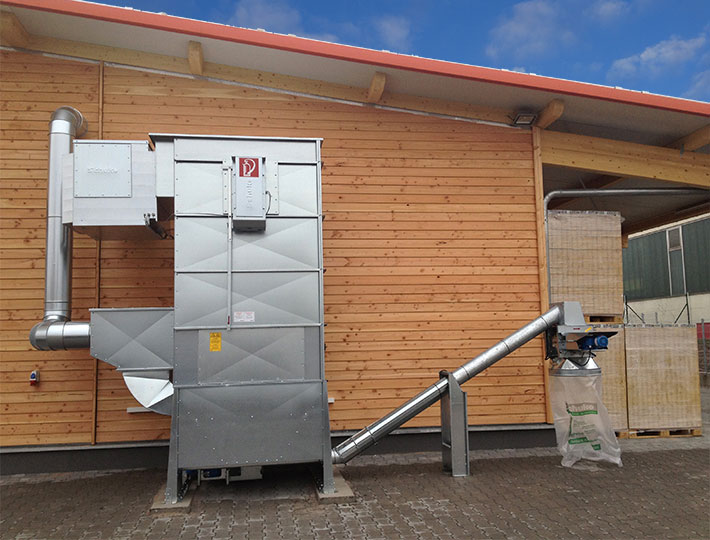 Schuko Vacomat - stationary dust extractor with disposal via an inclined screw conveyor